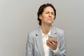 Frustrated woman hold phone crying, stunned with bad negative news disciplinary action and dismissal