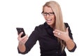Frustrated woman looking at her mobile Royalty Free Stock Photo