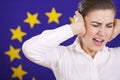 Frustrated woman screaming over european flag Royalty Free Stock Photo