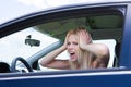 Frustrated woman screaming sitting in car Royalty Free Stock Photo