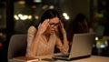 Frustrated woman working laptop, nervous about mistakes, stressful job, problem