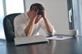 Frustrated young business man working on laptop computer at home Royalty Free Stock Photo