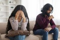 Frustrated young indian couple after quarrel at home Royalty Free Stock Photo