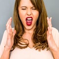 Frustrated Young Woman Screaming In Anger Royalty Free Stock Photo