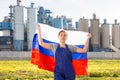 Frustrated young woman holds the national flag of Russia Royalty Free Stock Photo