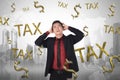 Frustration asian businessman with tax time sign Royalty Free Stock Photo