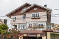 FRUTILLAR, CHILE - MARCH 1, 2015: House with a store selling Kuchen German cake in Frutillar village. The region is Royalty Free Stock Photo