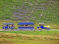 Frutt train Frutt-Zug - tourist-passenger mini road train in the area of the alpine lakes Melchsee and Tannensee, Melchtal