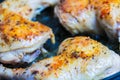 Fry chicken legs in a pan with spices.