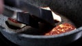 Fry halloumi cheese in a gray frying pan. Fried cheese in pan, close up.