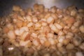 Fry the pork skin in a large frying pan Royalty Free Stock Photo