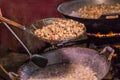 Fry the pork skin in a large frying pan on the stove Royalty Free Stock Photo