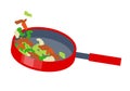 Fry vegetables in a frying pan-Side view Royalty Free Stock Photo