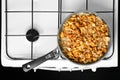 Frying chanterelle mushrooms in a pan Royalty Free Stock Photo