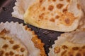 Frying chebureks in oil on a frying pan Royalty Free Stock Photo