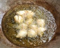 Frying cooking samosa