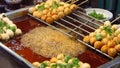 Frying Fishballs at an Asian Street Market