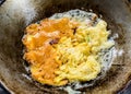 Frying omelet in pan Royalty Free Stock Photo