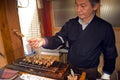 Frying oysters, Miyajima, Japan