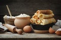 Frying pan of baked pancakes, ingredients for pancakes making. Royalty Free Stock Photo