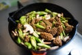 Frying pan full of morels and asparagus Royalty Free Stock Photo