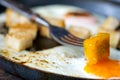 Scramble eggs with small toasted bread Royalty Free Stock Photo