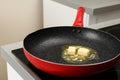 Frying pan with melting butter Royalty Free Stock Photo