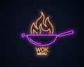 Frying pan neon sign. Wok with fire flame neon Royalty Free Stock Photo