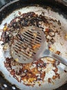 Frying pan with the remains of burnt scrambled eggs Royalty Free Stock Photo