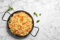 Frying pan with spaghetti and shrimps Royalty Free Stock Photo