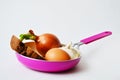 Frying pan with sprout, bread, egg and garlic