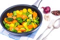 Frying pan with stewed vegetables