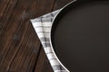 Frying pan on a wooden background Royalty Free Stock Photo