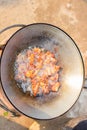 Frying pork on pot with boiling oil.delicious food, pork graves Royalty Free Stock Photo