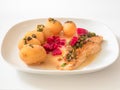 Frying salmon with beet and potatoes Royalty Free Stock Photo
