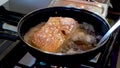 frying SUPER CRISPY PORK BELLY ( panceta a pururuca ) , pouring boiling iol, making crackling panceta