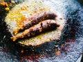 Sardine fish fried in a drying pan in Kerala style. Royalty Free Stock Photo