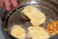 Frying zucchini meatballs in the hot oil Royalty Free Stock Photo