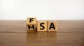 FSA or HSA symbol. Turned a cube and changed the word `FSA - Flexible Spending Account` to `HSA - Health Savings Account`. Royalty Free Stock Photo