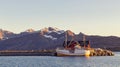 Fshing boats in harbor at midnight sun in Northern Norway, Lofoten Island, Ramberg, Norway Royalty Free Stock Photo