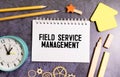 FSM Field Service Management -top view of a piece of torn paper with text Royalty Free Stock Photo