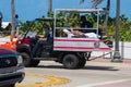 Ft Lauderdale Fire Rescue transporting a Caucasian woman in a small modified ATV ambulance after she fell ill from heat stroke on