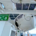 An empty deck with a life boat above of a cruise ship sailing on the Atlantic ocean