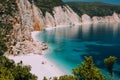 Fteri beach. Blue lagoon with rocky coastline, Kefalonia, Greece. Calm clear blue emerald green turquoise sea water with