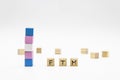 FTM lettering made of wooden cubes and transgender flag on white background. Conceptual illustration lesbian, gay, bisexual, and