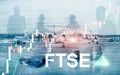 FTSE 100 Financial Times Stock Exchange Index United Kingdom UK England Investment Trading concept with chart and graphs Royalty Free Stock Photo