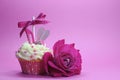 Fuchsia pink theme cupcake with shoe and heart decoration