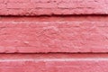 Fuchsia stone wall. Exterior of an old building. Background. Space for text Royalty Free Stock Photo