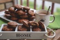 Fudge brownie cookies with penut and cheese filling with cacao on the mug Royalty Free Stock Photo