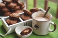 Fudge brownie cookies with penut and cheese filling with cacao on the mug Royalty Free Stock Photo